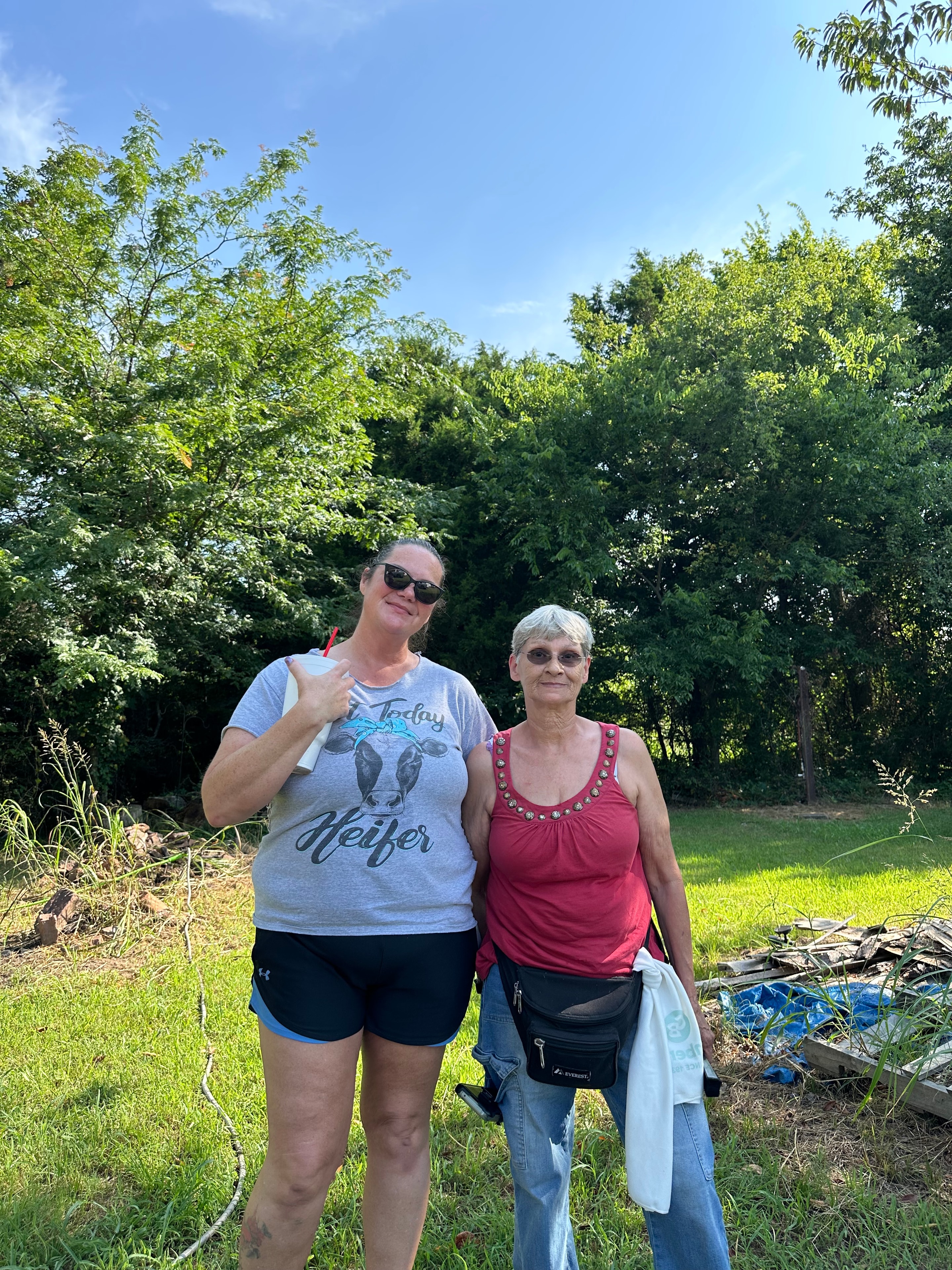 Two tribal members outdoors at Green Tree Ceremony July 11, 2026