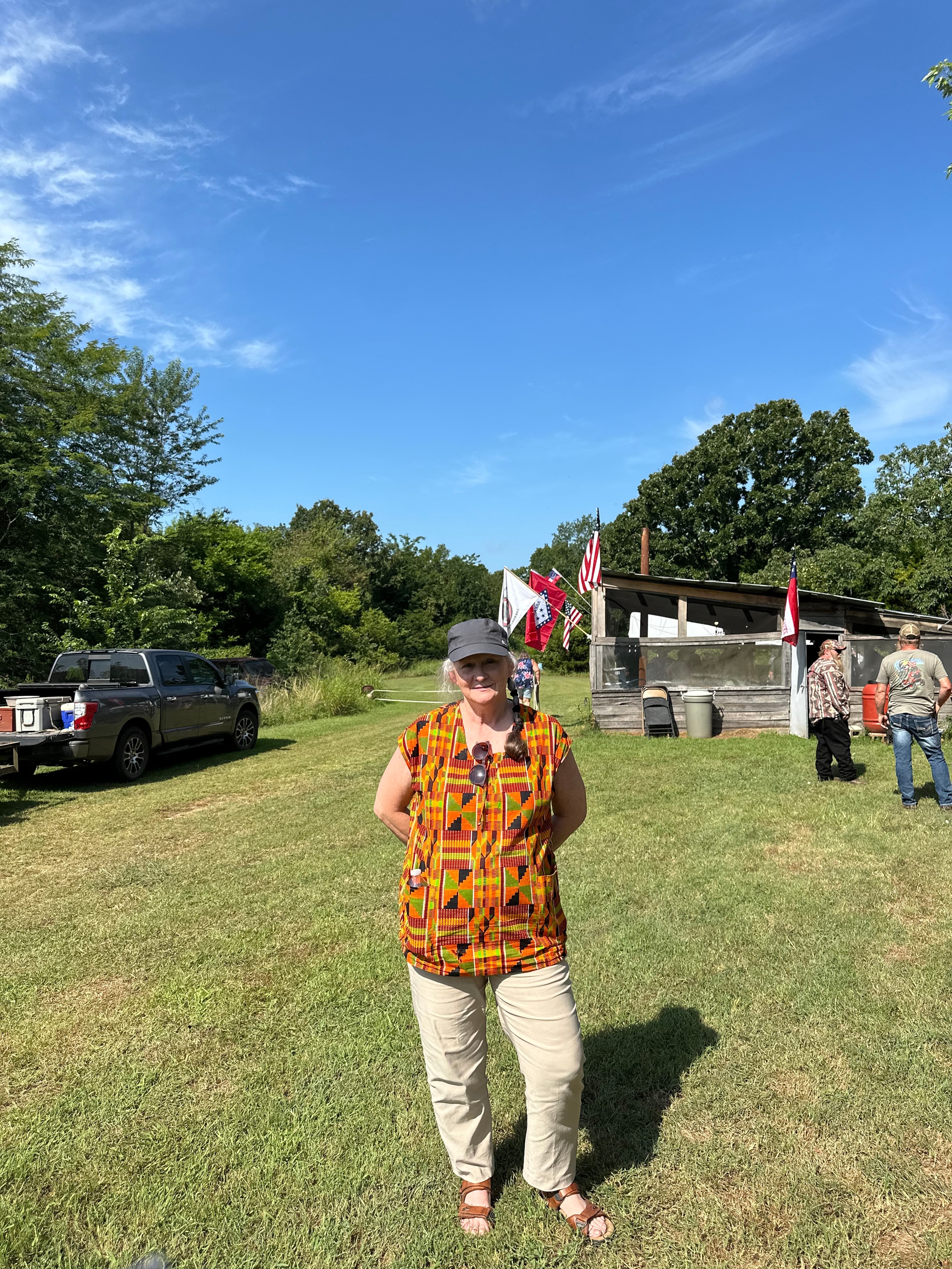 Tribal member in colorful patterned shirt at Green Tree Ceremony July 11, 2026