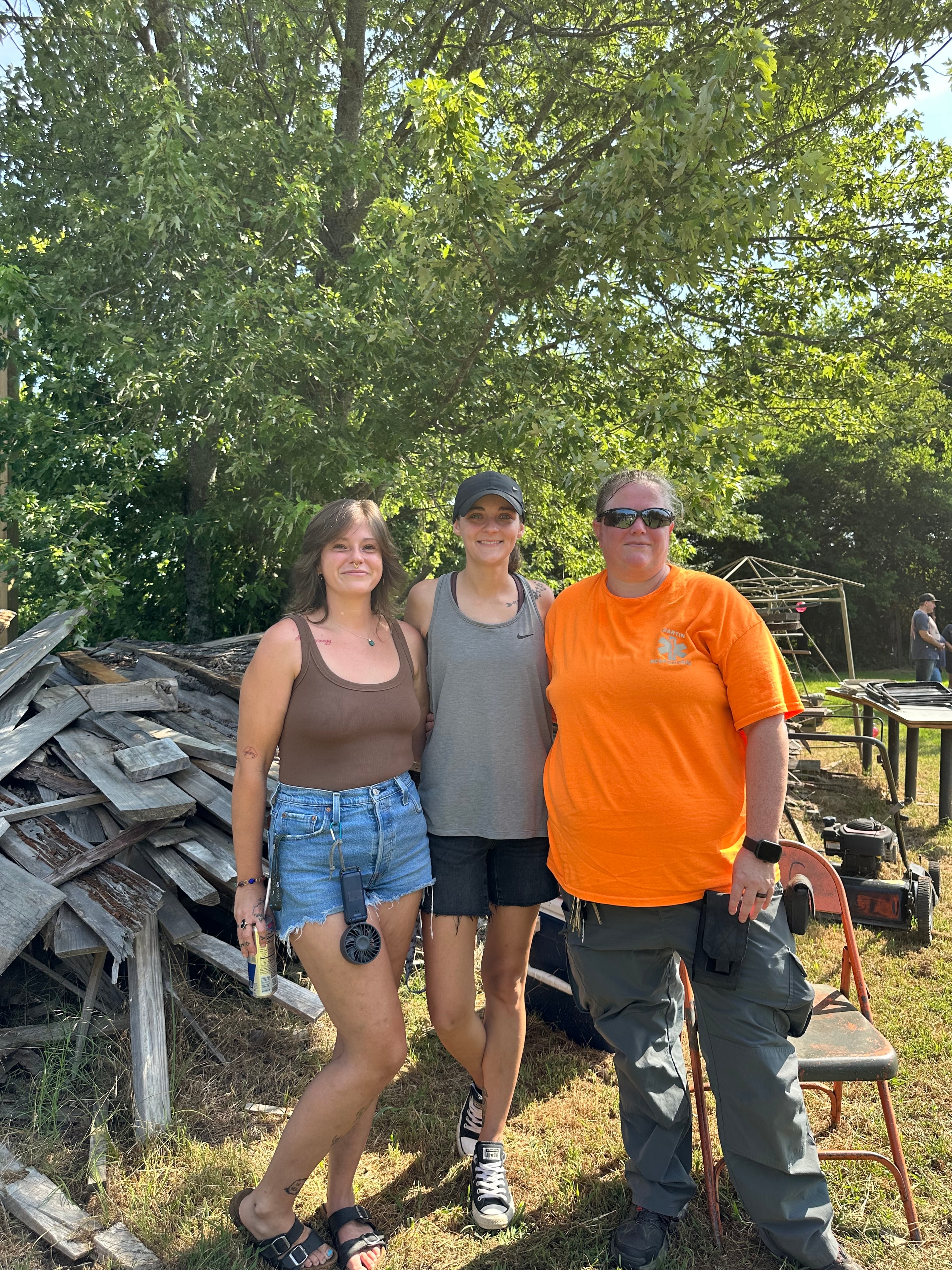 Three tribal members together outdoors at Green Tree Ceremony July 11, 2026