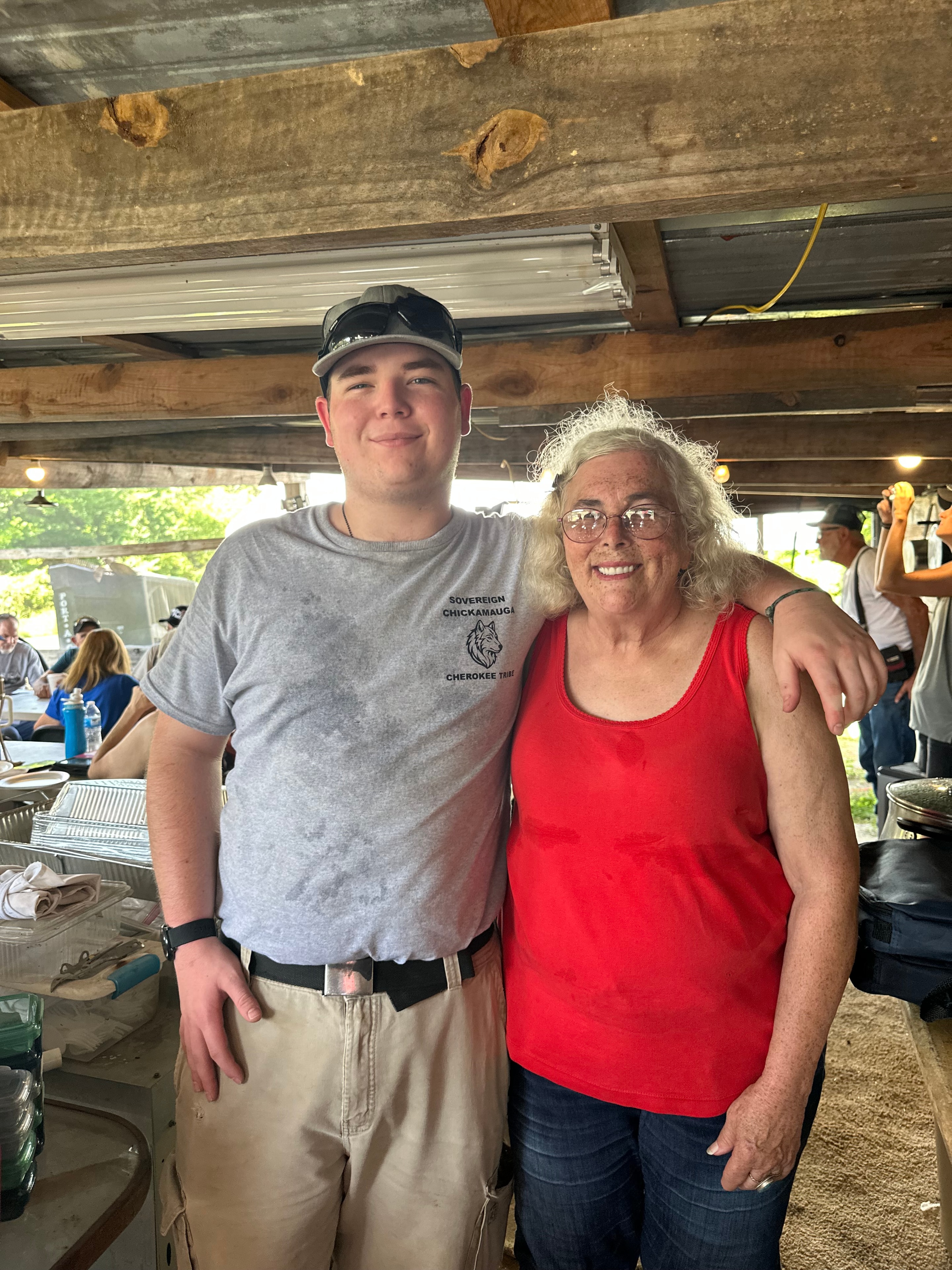 Two tribal members wearing Sovereign Chickamauga Cherokee Tribe shirt at Green Tree Ceremony July 11, 2026
