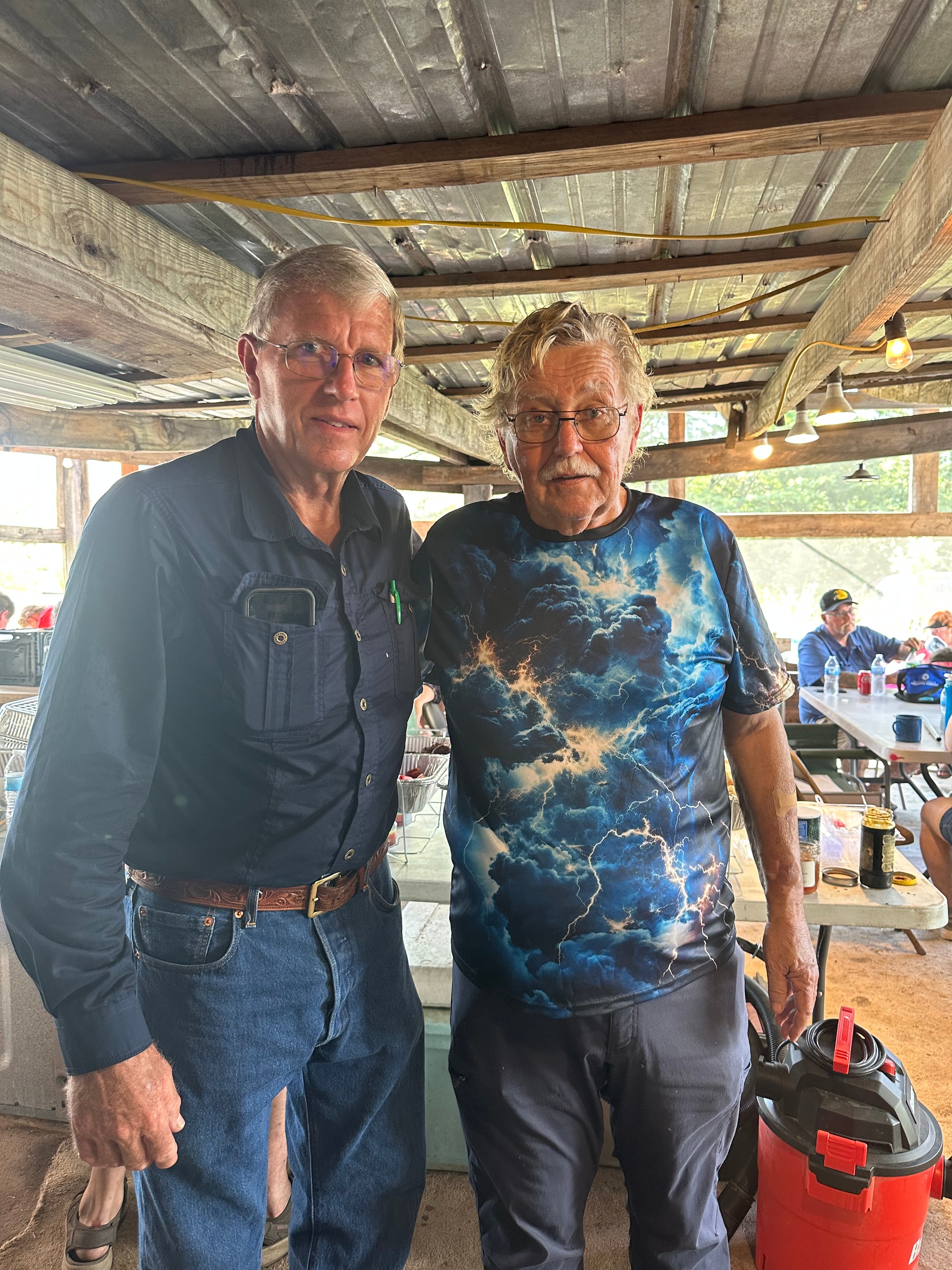 Chief Jim Davis and Bob Dixon inside the cook house at Green Tree Ceremony July 11, 2026