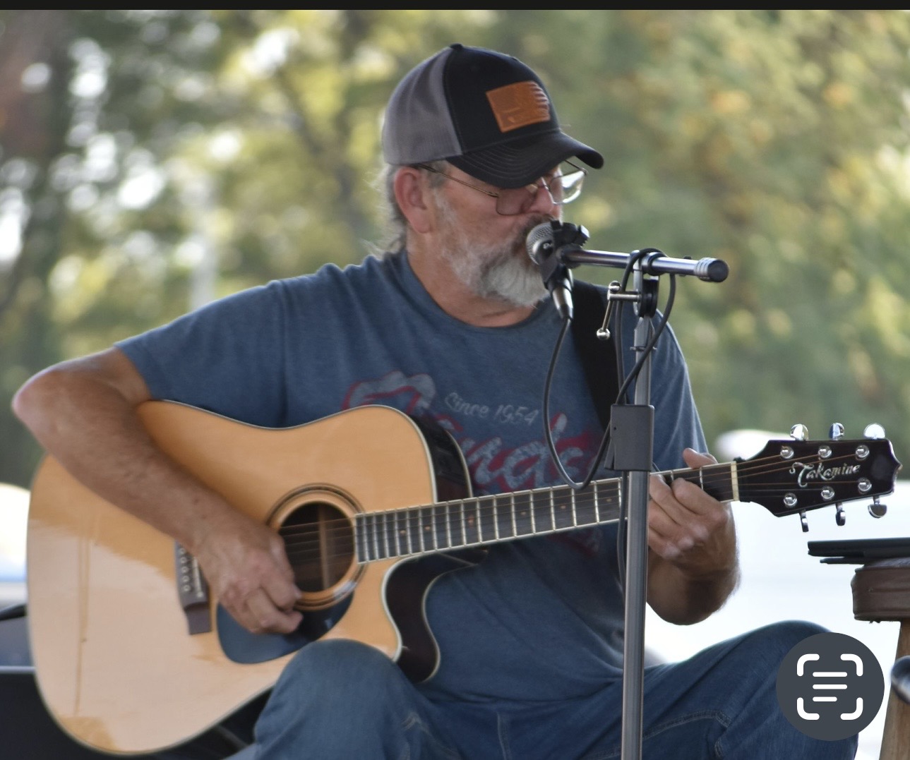 Musician performing at Cherokee Chickamauga community gathering