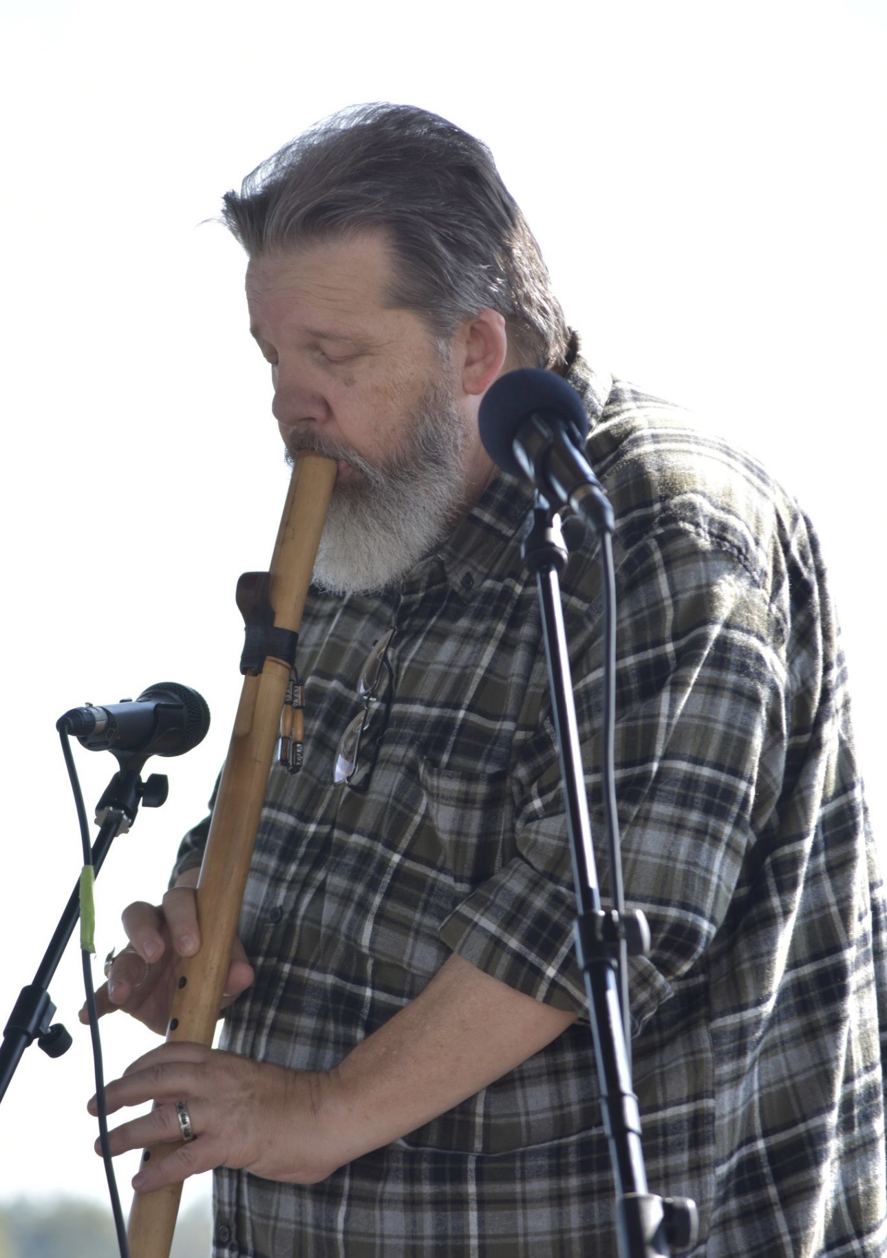 Traditional Cherokee flute player performing at community event