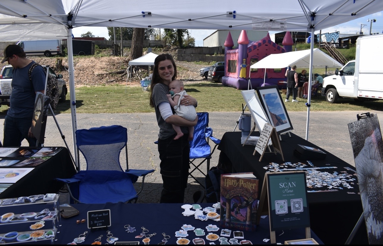 Tribal member with baby at community arts and crafts event — Sovereign Chickamauga Cherokee Tribe of Arkansas