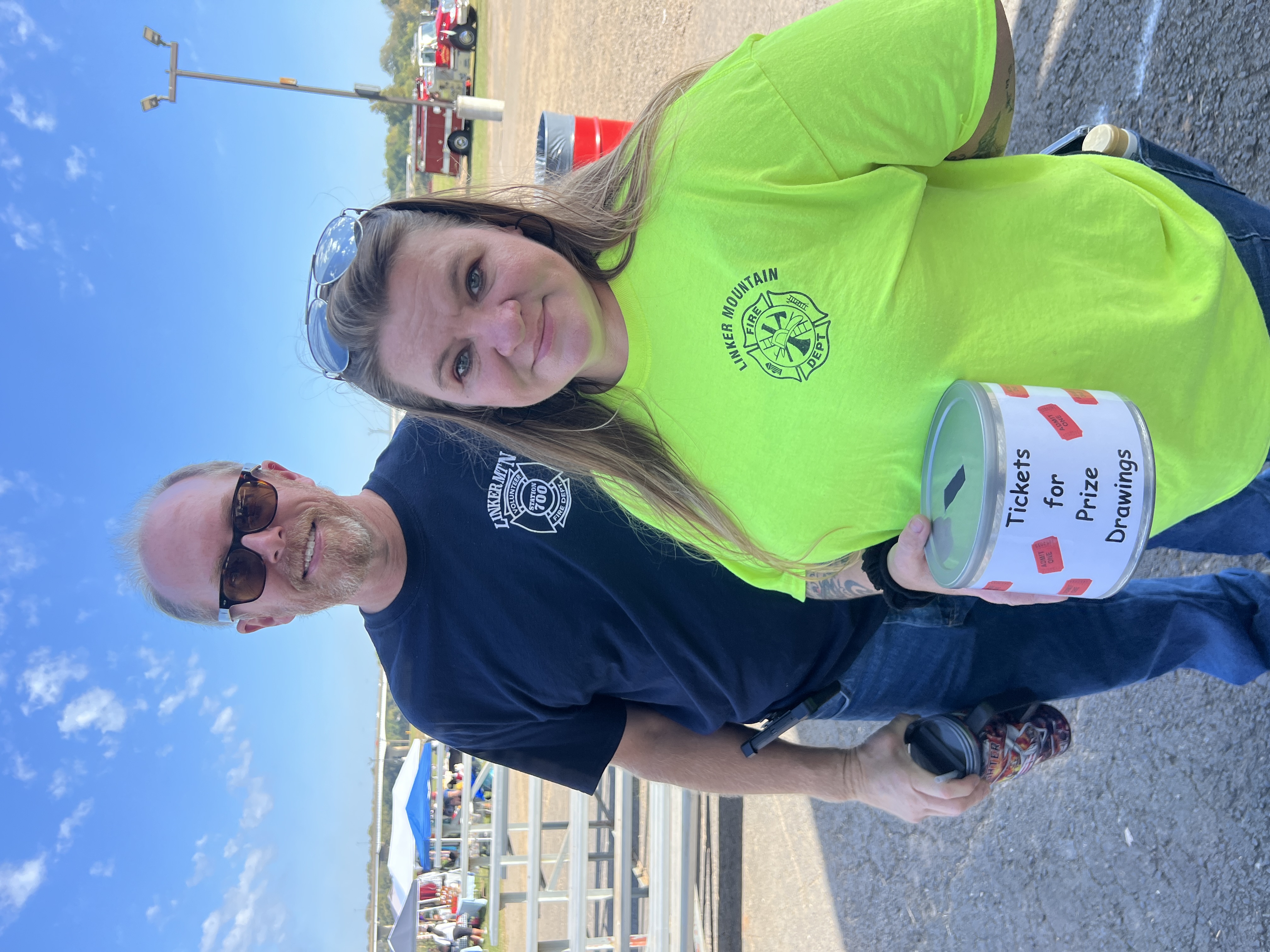 Linker Mountain Fire Department volunteers with prize drawing tickets at October Festival 2025